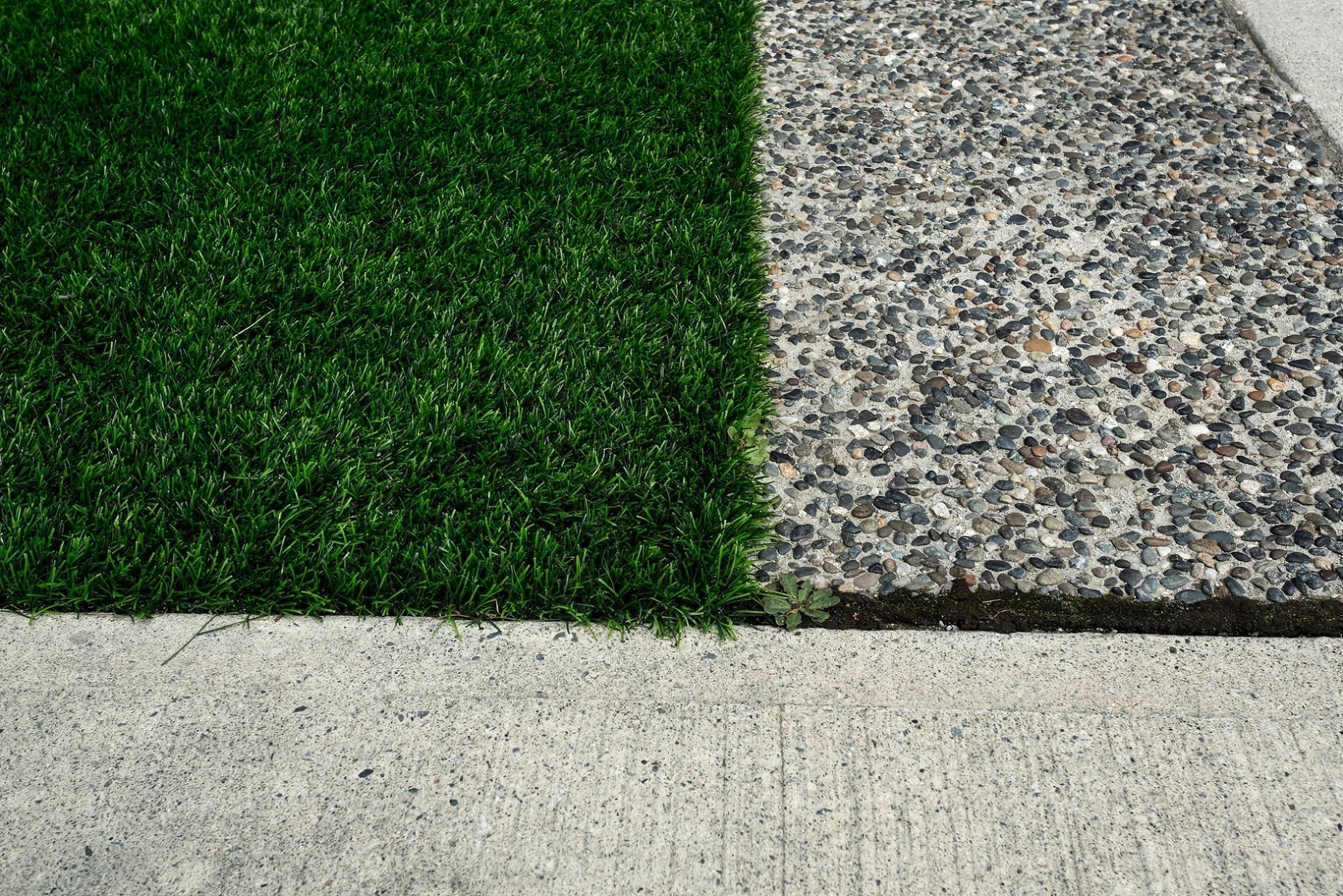 Premium Grass Blades Synthetic Artificial Turf Lush Sidewalk