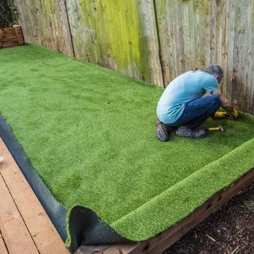 Installing premium grass blades synthetic turf